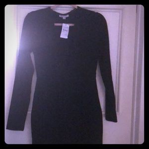 MODERN.... BEAUTIFUL....LOWCUT... DRESS